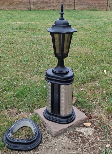 Short prototype boolard with lamp outside