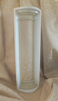 Quarter column covered in fabric.