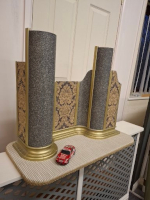Example corner prototype gold colour column base and trim, granite finish with patterned flats.