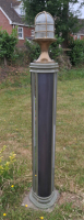 Tall prototype boolard exterior with brass light